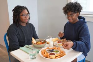 Customers eat together at Dragonfly Café